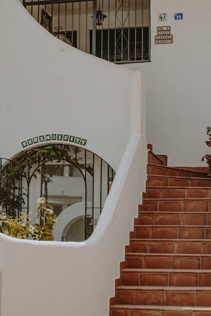 Discover the charm of Mijas, Spain with these rustic steps and whitewashed walls.